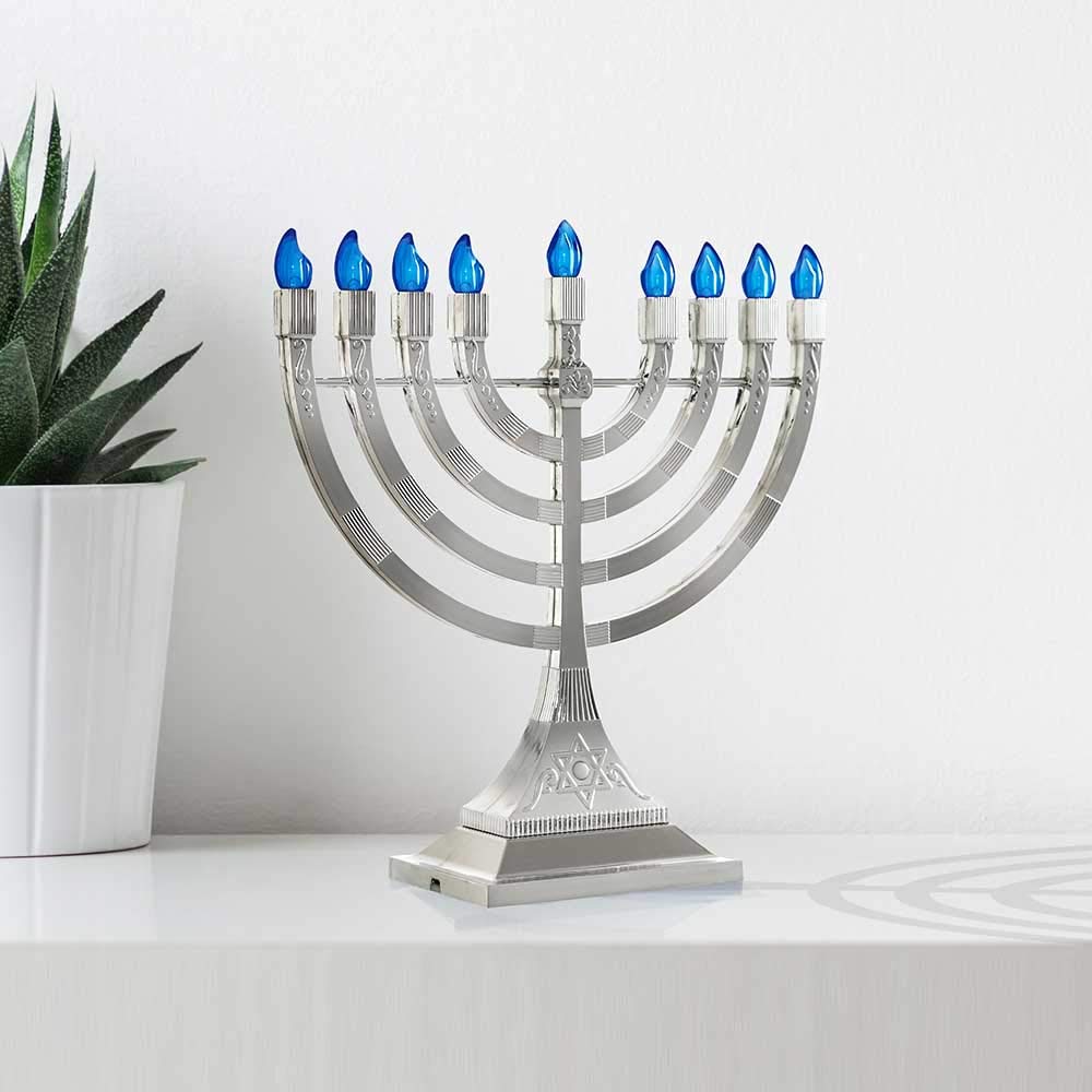 Zion Judaica micro USB cable plugged into side base for versatile power options