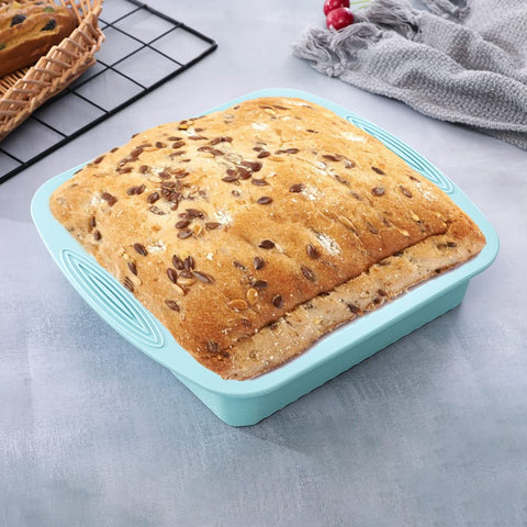 zmkele muffin pan being flexed to demold muffins for quick release