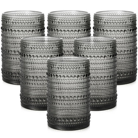 ZMOWIPDL front view of six grey hobnail glasses showing cohesive set and style