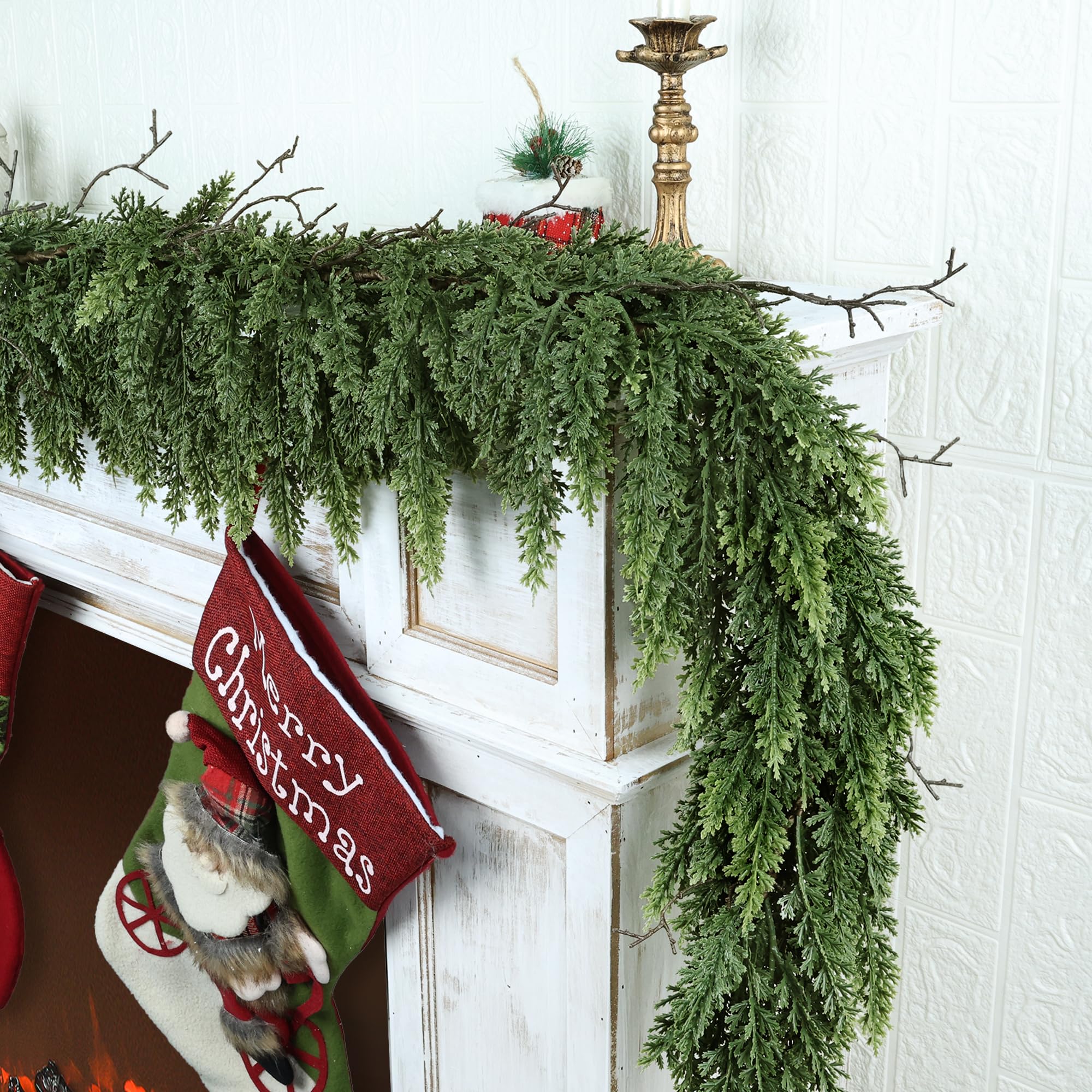 Zmtyykh garland styled on mantel with lights showing warm holiday ambiance