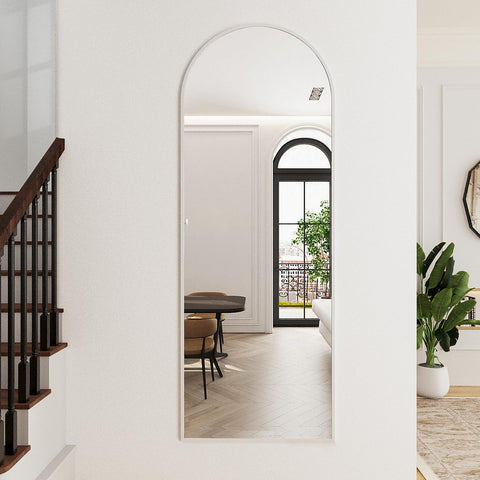 ZMYCZ mirror leaning against wall in living room to enlarge space and reflect light