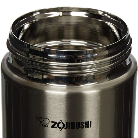 Zojirushi lid vent and dimples detail for easier opening and pressure release after hot fills