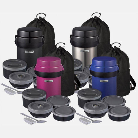 Zojirushi Mr. Bento beside a water bottle to show 41 oz scale and portion control benefit