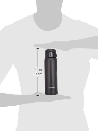 Zojirushi mug held in hand to show 16-ounce scale and lightweight portability benefit