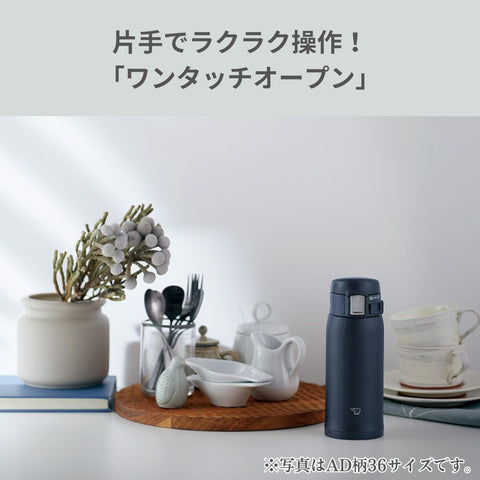 Zojirushi wide mouth with ice inserted demonstrating easy filling and cleaning advantage