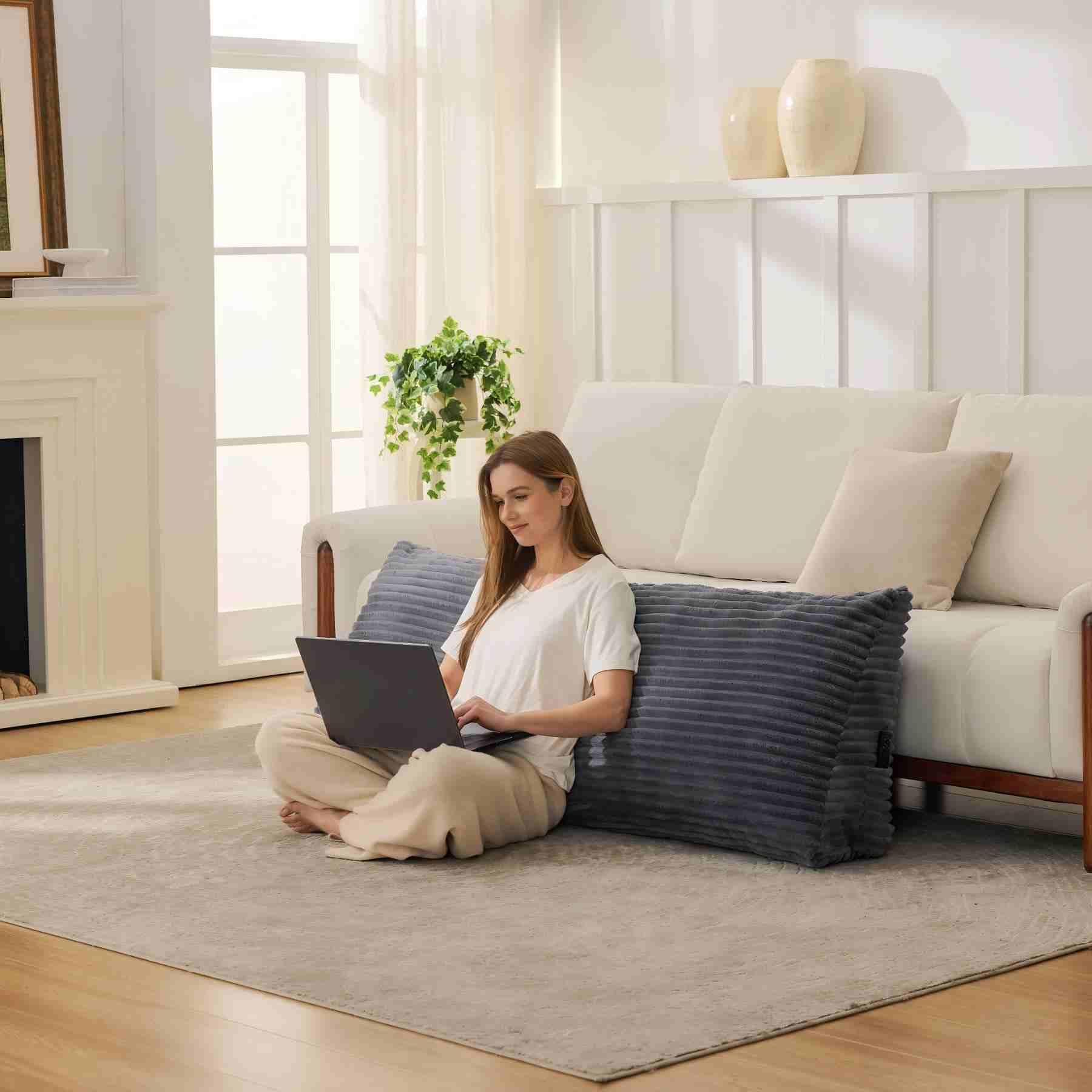 Zonamat in a bedroom reading setup illustrating support and relaxed posture