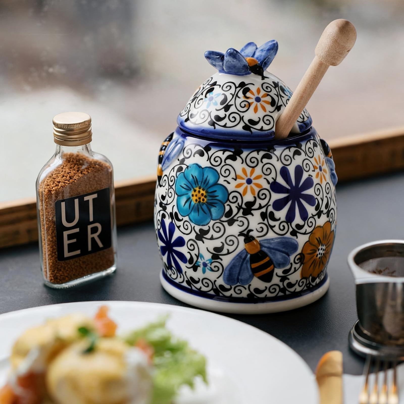 ZOOBEE jar in use drizzling honey over toast for clean, even coverage