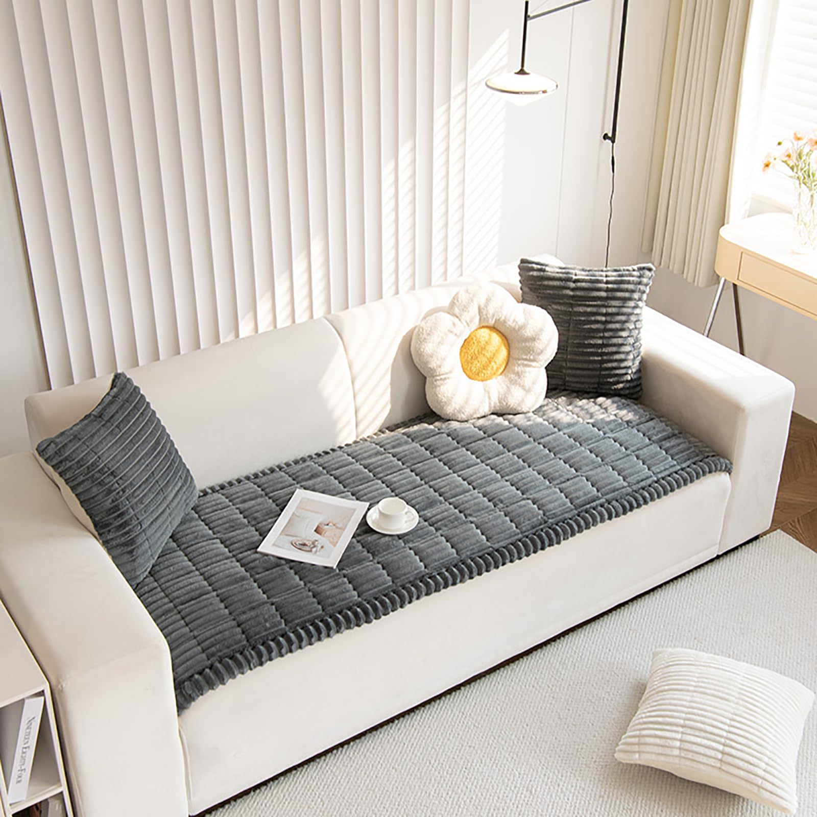 ZQFFB size comparison on sofa showing fit across cushions