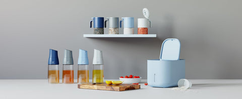 Zuutii pouring pet food from container showing controlled dispense and reduced spills