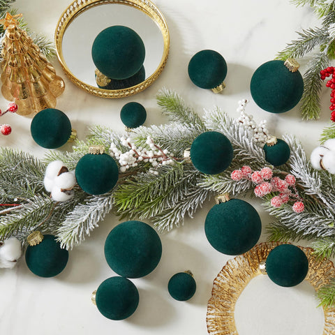 ZVAVH ornaments styled on mantel and wreath conveying cohesive decor and festive atmosphere benefit