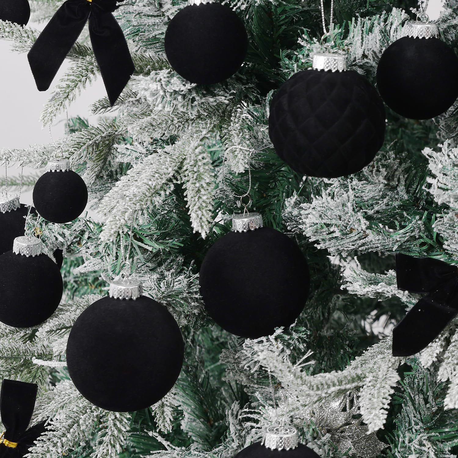 ZVAVH ornaments hanging on a Christmas tree adding soft warmth