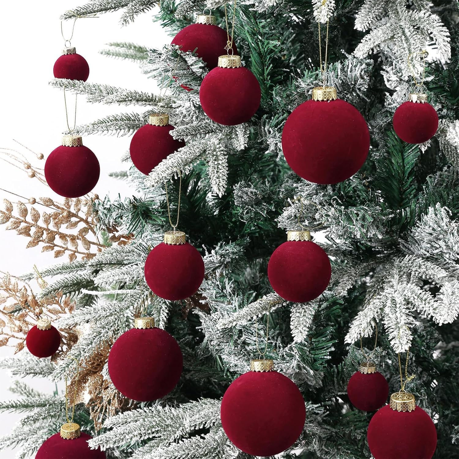 ZVAVH ornaments hanging on Christmas tree adding burgundy warmth and visual depth