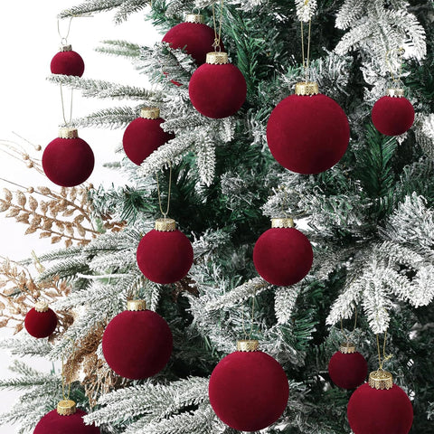 ZVAVH ornaments hanging on Christmas tree adding burgundy warmth and visual depth