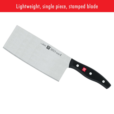 ZWILLING cleaver resting on wooden board for safe cutting surface benefit