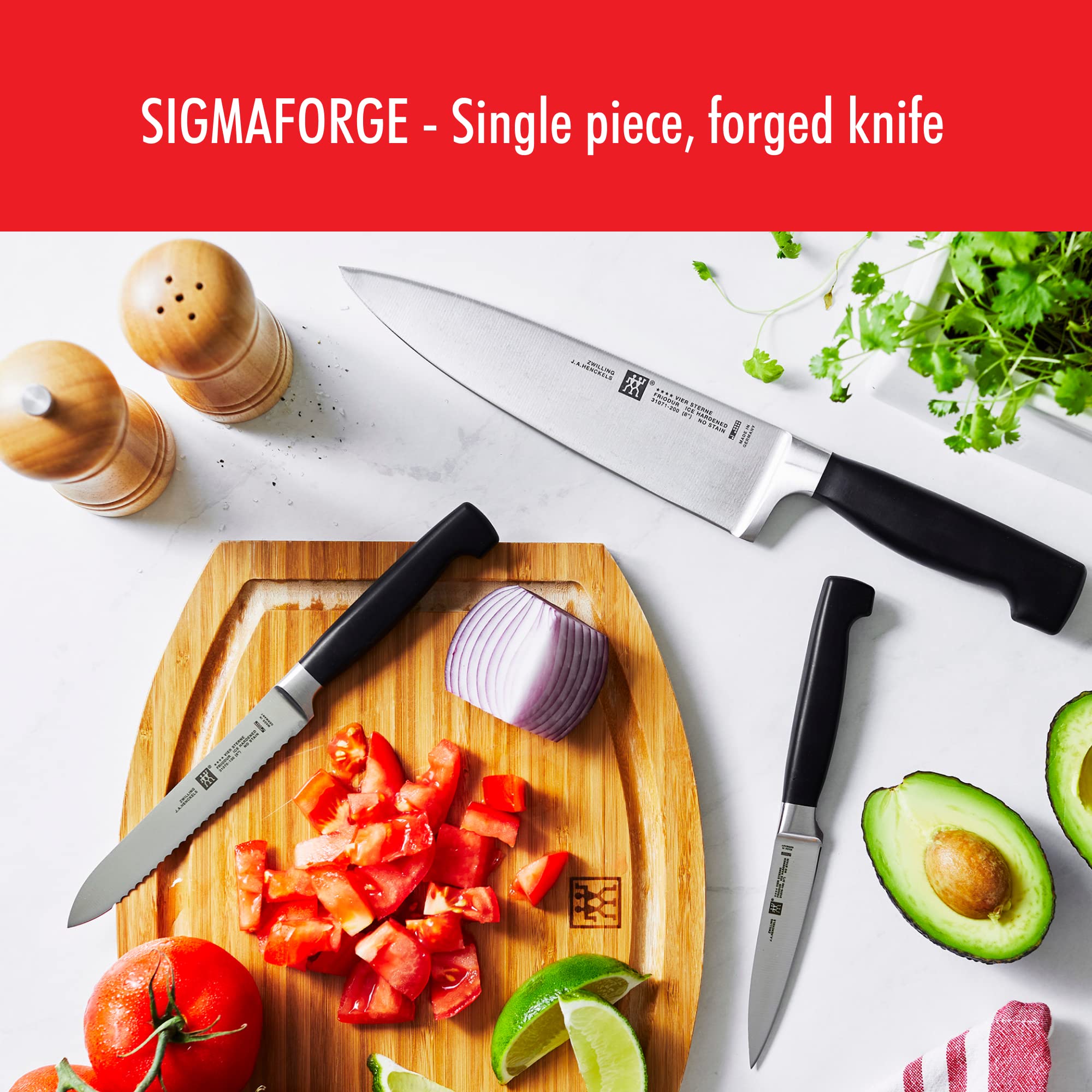 Cook using ZWILLING chef's knife demonstrating balanced control and precise chopping
