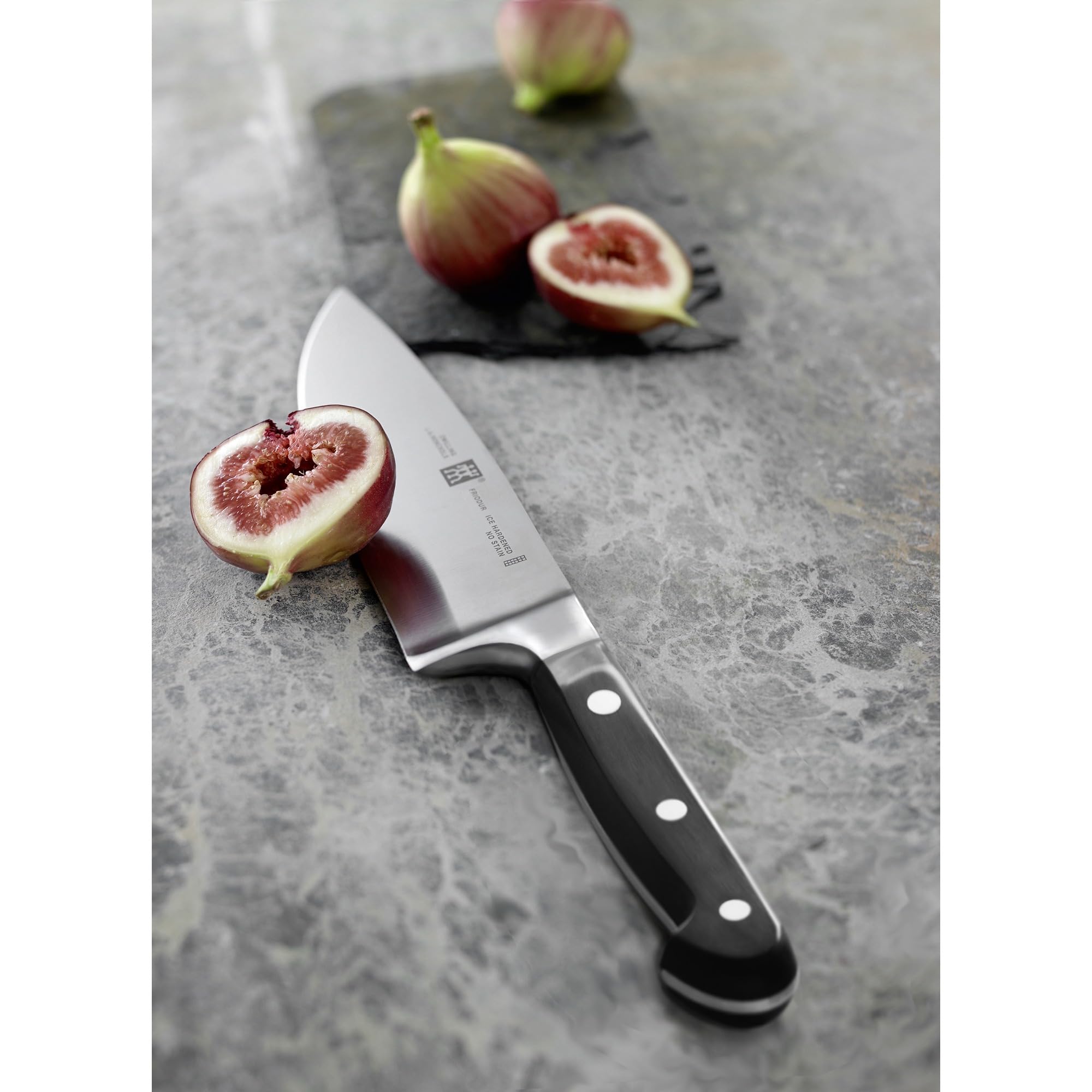 ZWILLING handle close-up highlighting ergonomic three-rivet grip comfort