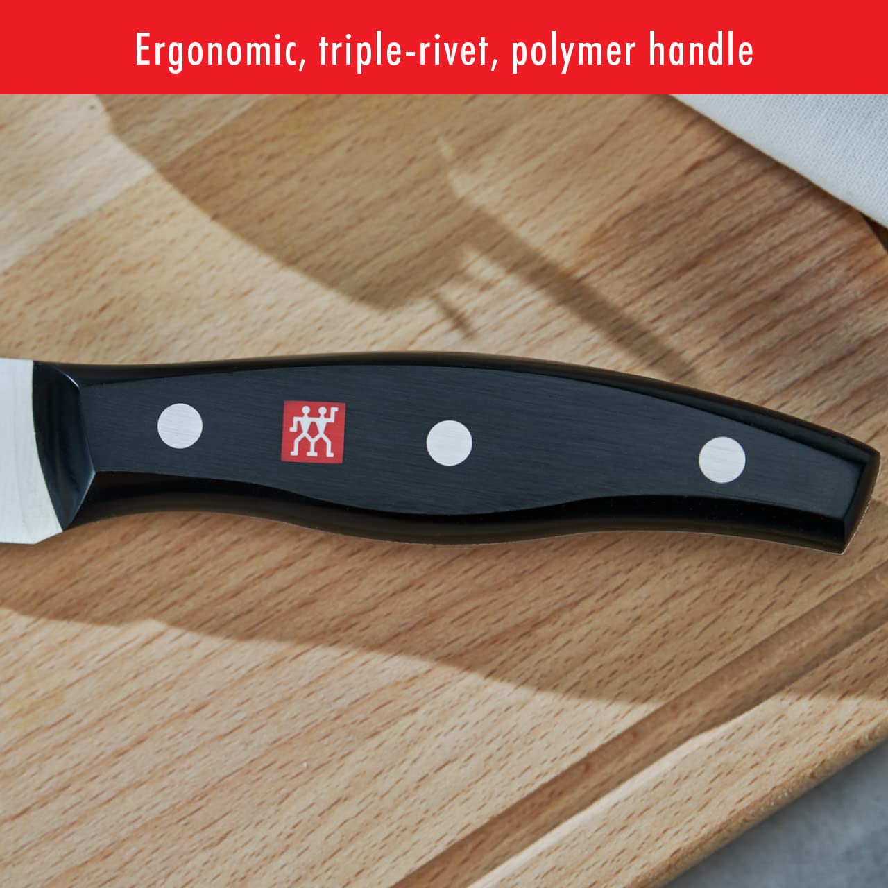 ZWILLING knife beside ruler showing 8-inch blade for accurate size reference