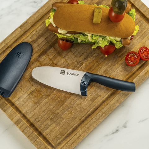 ZWILLING Twinny in use with child cutting fruit under supervision