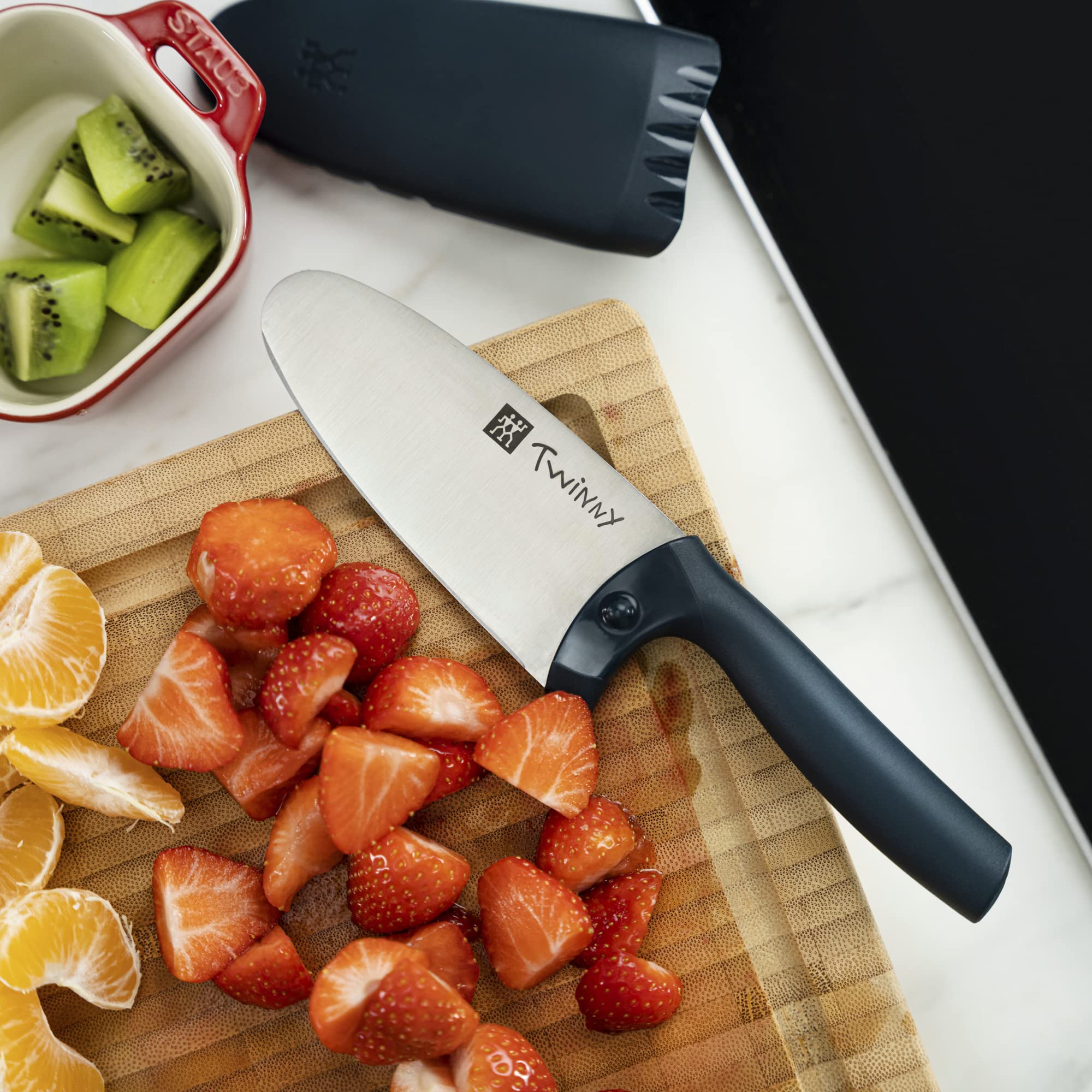 ZWILLING Twinny beside adult chef knife for clear size comparison