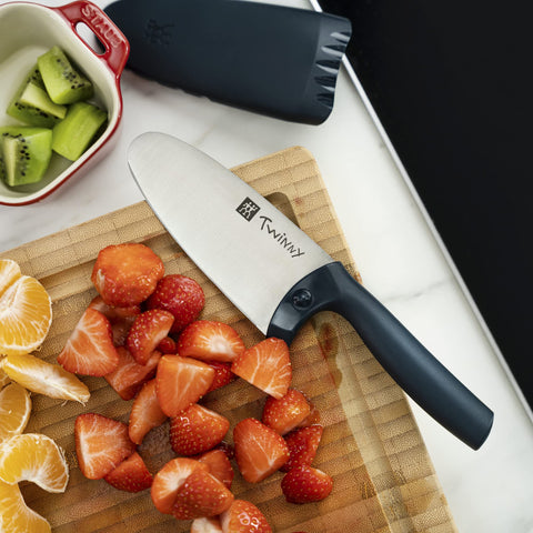 ZWILLING Twinny beside adult chef knife for clear size comparison