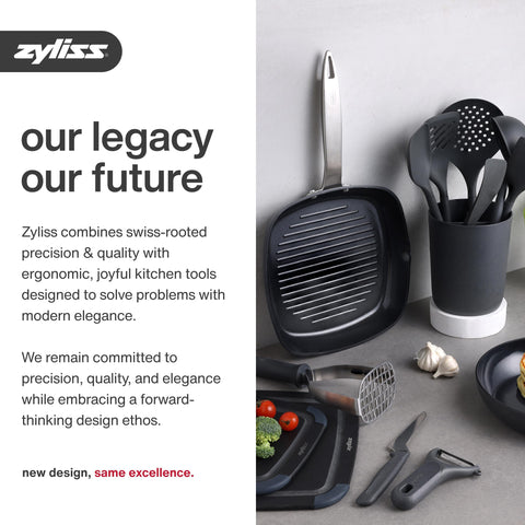 Zyliss Susi 3 cleaning tool detail revealing integrated scrubber for removing trapped bits